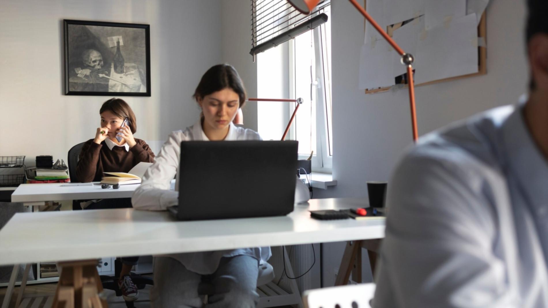 Person reviewing financial statements and budget planning